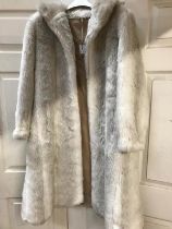 Size 16 Faux Fur Ladies coat. General wear and marks. Metal hook and eye fastening