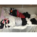 A Large quantity of ladies shirts/ tops. Various sizes