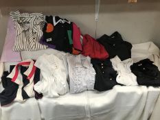 A Large quantity of ladies shirts/ tops. Various sizes
