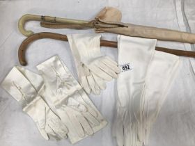 Four evening gloves, walking stick and a umbrella A/F