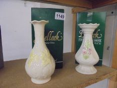 Two boxed Belleek vases.