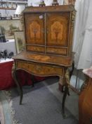 A late Victorian marquetry inlaid ladies writing desk in good condition, COLLECT ONLY.