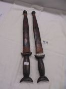 Two vintage (African Tribal?) daggers in sheaths.