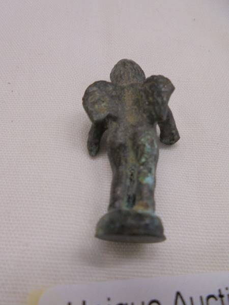 A small Roman bronze of Eros. - Image 2 of 2