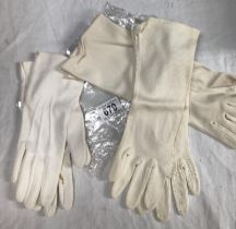 Three pairs of evening gloves, White . A/F
