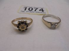 A 9ct solitaire ring size O, 2.8 grams and a mis-shaped 9ct gold ring, 2 grams.