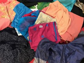 A large quantity of Sari's and Sari related clothing
