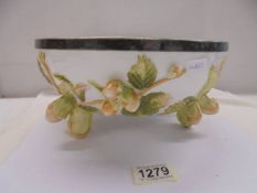 A ceramic bowl featuring oak leaves and acorns with plated rim, 28 cm diameter.