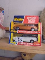 Two boxed Dinky No.123 Princess 2200HL saloon cars in white and copper.