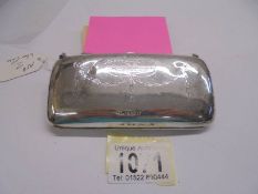 A silver evening purse, 70 grams.