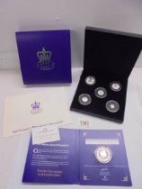 A cased Queen Elizabeth II 1926-2022 silver sovereign set and a 1926-2022 silver crown.