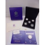 A cased Queen Elizabeth II 1926-2022 silver sovereign set and a 1926-2022 silver crown.