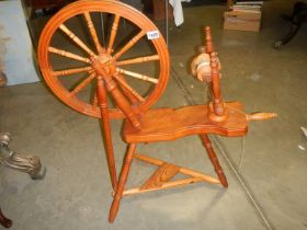 A good quality pine spinning wheel, COLLECT ONLY.