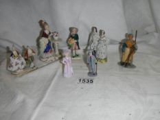 A mixed lot of small porcelain and lead figures.