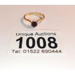 A 9ct gold ring set garnet, size L, 1.3 grams.