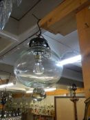 A heavy glass hall light. COLLECT ONLY.