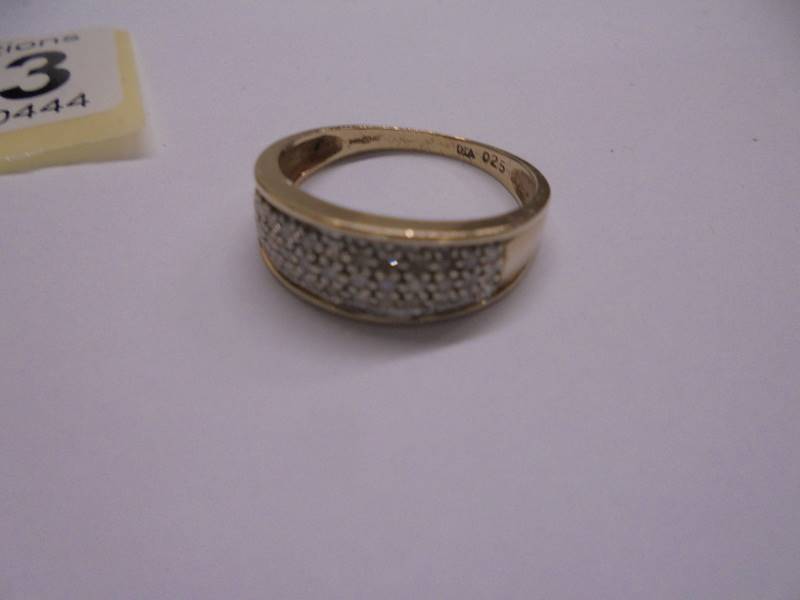 A diamond band ring quarter carat diamond weight, hall marked 9ct gold shank, size O. - Image 2 of 2