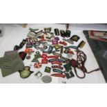 A large collection of military and other cloth badges including Kenya air force, honor guard, scouts