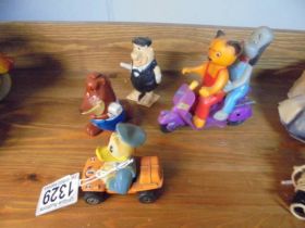 A vintage Marx friction Sooty & Sweep on a scooter, Matchbox Donald Duck and other toys.