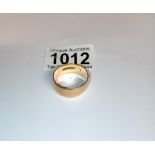 A 9ct gold gent's wedding ring, size W. 7.5 grams.