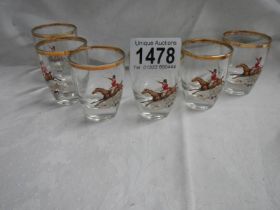 A set of six mid 20th century toddy glasses featuring horses with riders.