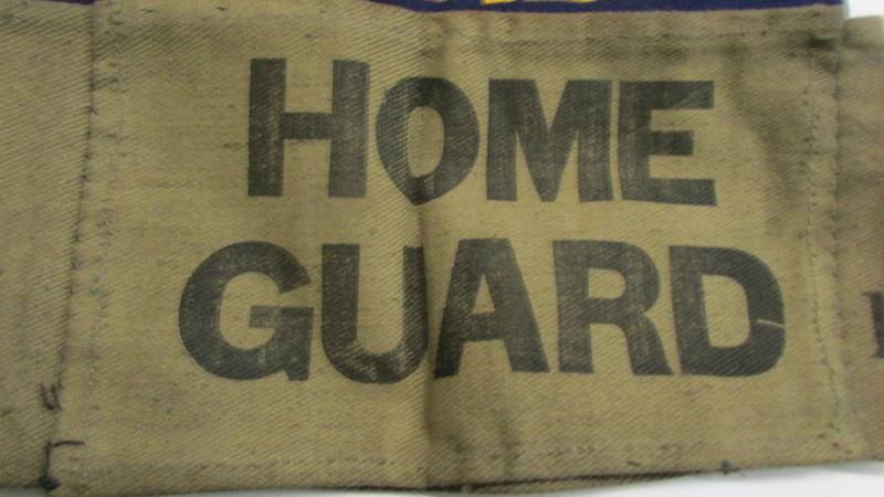 An original WW2 home guard arm band and four fire guard arm band of indeterminate age. - Image 2 of 3