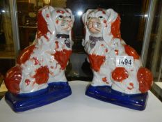 A good pair of late 19th century Staffordshire spaniels.