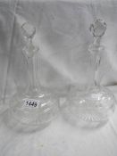 A pair of early 20th century glass decanters.