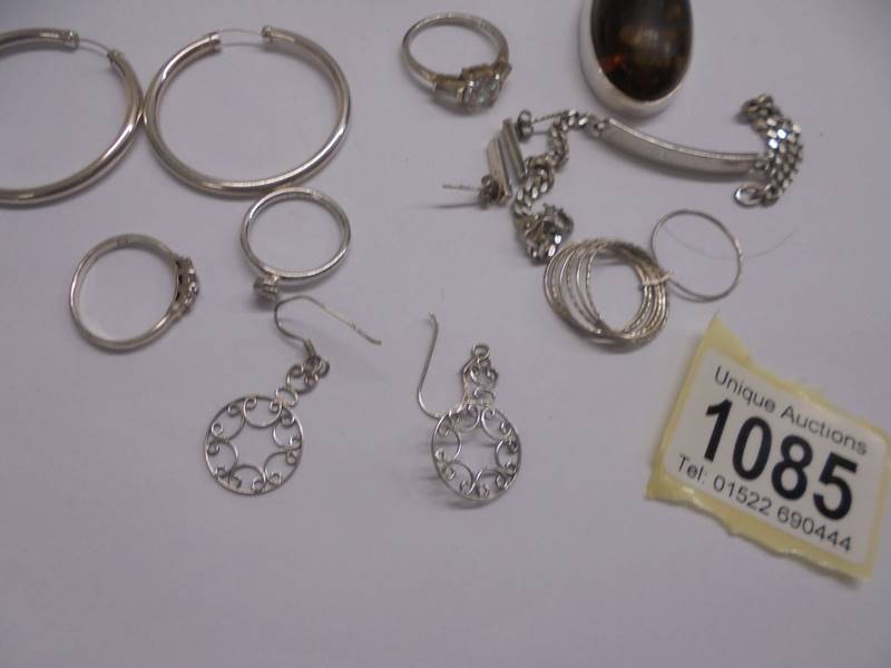 A mixed lot of silver jewellery including an amber pendant, amber set bracelet, rings, earrings etc - Image 3 of 3