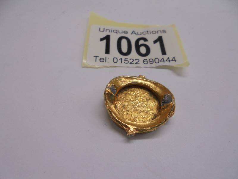 A gold coloured sixpence in an a/f mount. - Image 2 of 2