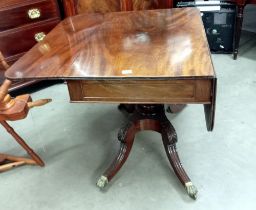 A mid Victorian mahogany center pedestal drop leaf table COLLECT ONLY