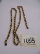 A 9ct gold chain (no clasp), 13.8 grams.