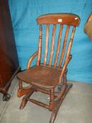 A Windsor style rocking chair, COLLECT ONLY.