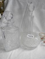 Two good cut glass decanters.