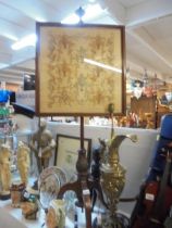 A mid 19th century mahogany pole screen with embroidered panel. COLLECT ONLY.