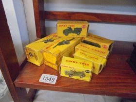 Seven boxed Dinky military vehicles (boxes in a/f condition).