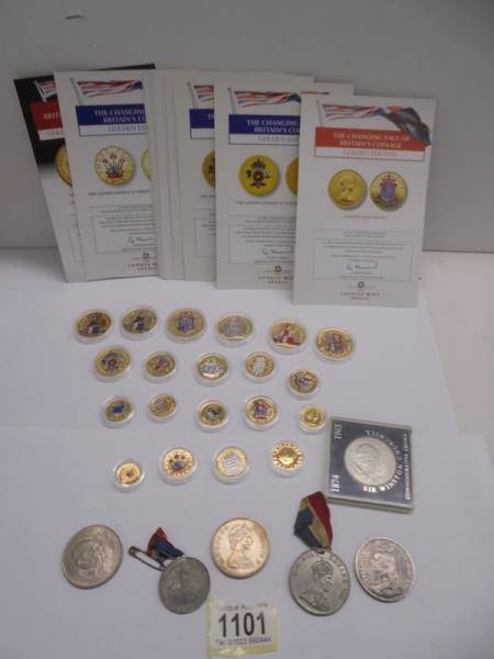 A quantity of The Changing Face of Britains coinage Golden Edition coins and other coins.