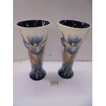 A pair of Old Tupton Ware hand painted 'Iris' vases, 20 cm tall.