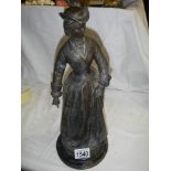 An early 20th century spelter figure (good repair to arm).