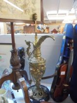 A heavy brass lamp in the form of a ewer, COLLECT ONLY.