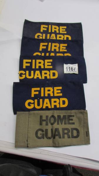 An original WW2 home guard arm band and four fire guard arm band of indeterminate age.