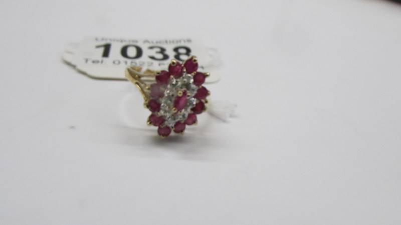 A yellow gold diamond and ruby ring, size M half, 2.42 grams. - Image 2 of 2