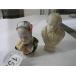 An early continental porcelain bust paperweight and one other.