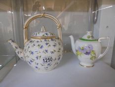 A Royal Doulton Glamis Thistle teapot and a Goode & Co., London teapot.