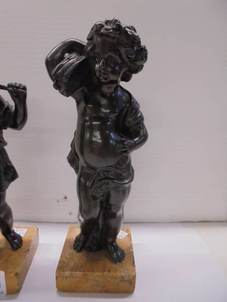 A pair of bronze 'Wheatsheaf' cherubs on bases, 20cm tall. - Image 2 of 3