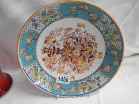 A Chinese hand painted plate.