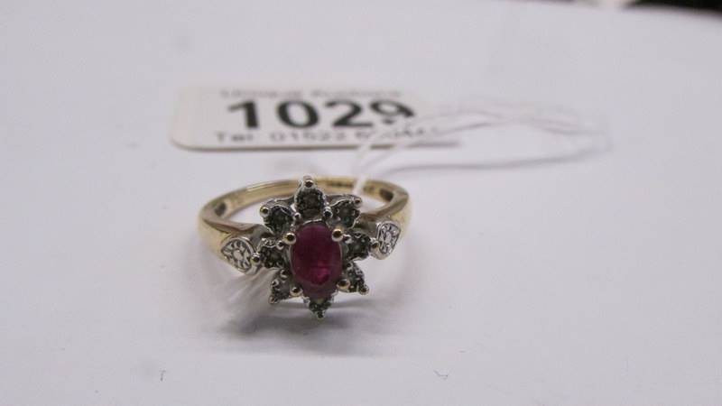 A 9ct yellow gold ruby and diamond ring, size M, 2.6 grams. - Image 2 of 2