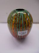 A hand painted vase, 16 cm tall.