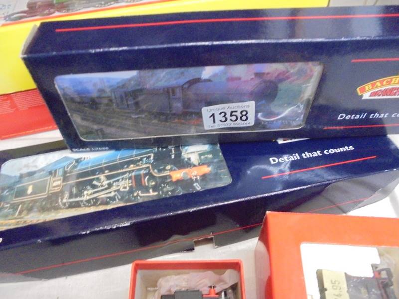 Two boxed Bachmann 31-860 and 31-706 locomotives.