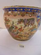 A hand painted Chinese 'fish' bowl, 24 cm deep x 32 cm diameter.